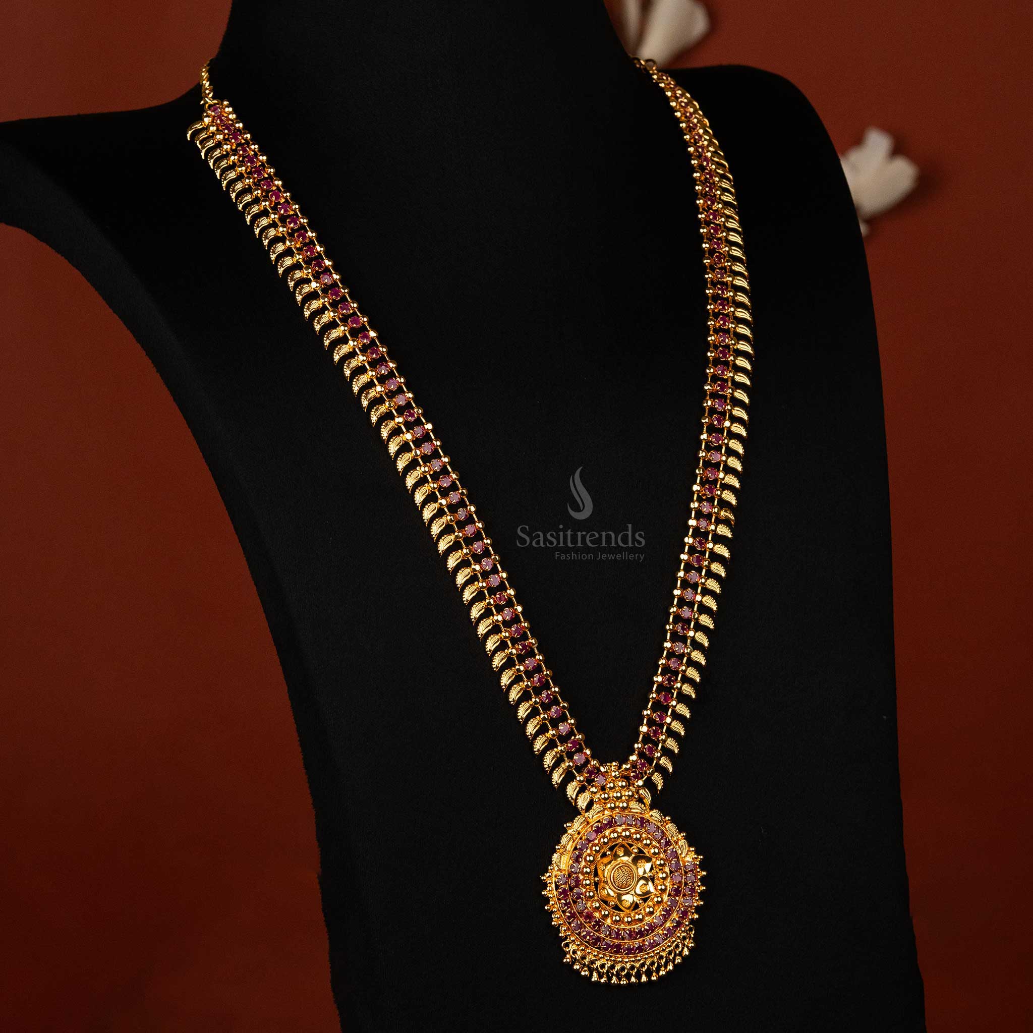 Luxurious ruby AD stone long haram necklace with ornate pendant 