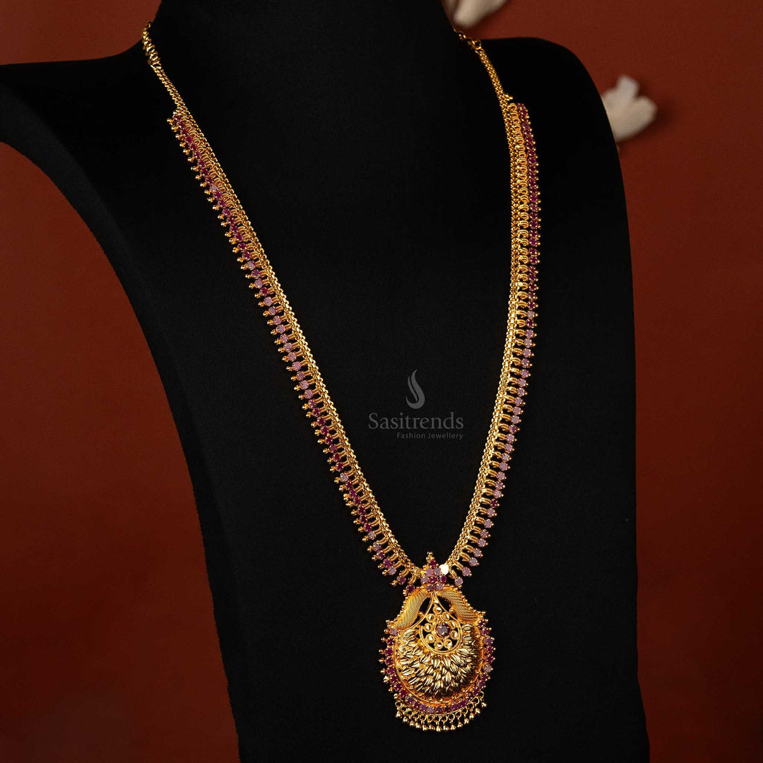 Front view of micro gold plated long necklace with ruby stones and crescent-shaped pendant