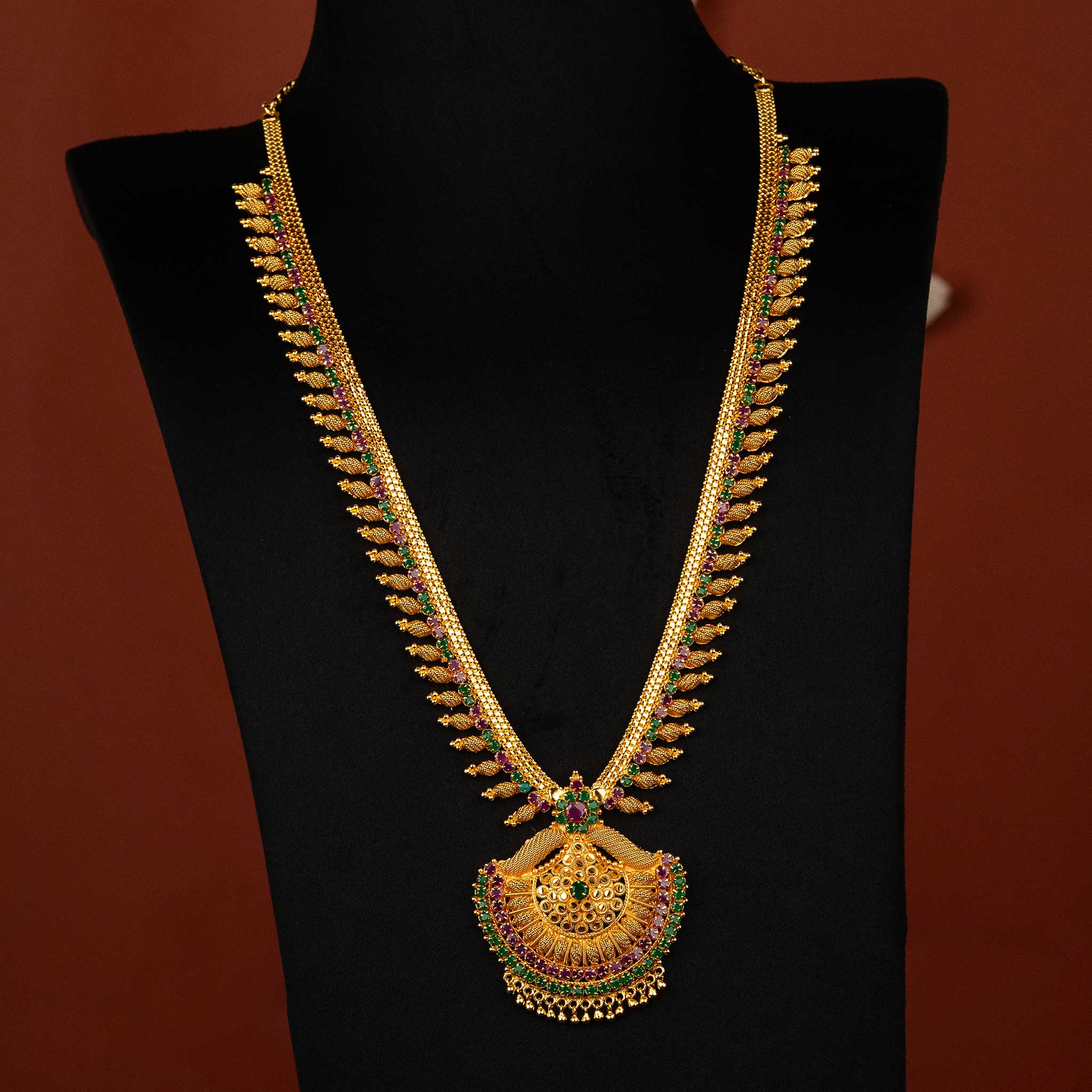 One gram gold plated long haram necklace with AD stones and fan-like pendant  - Sasitrends