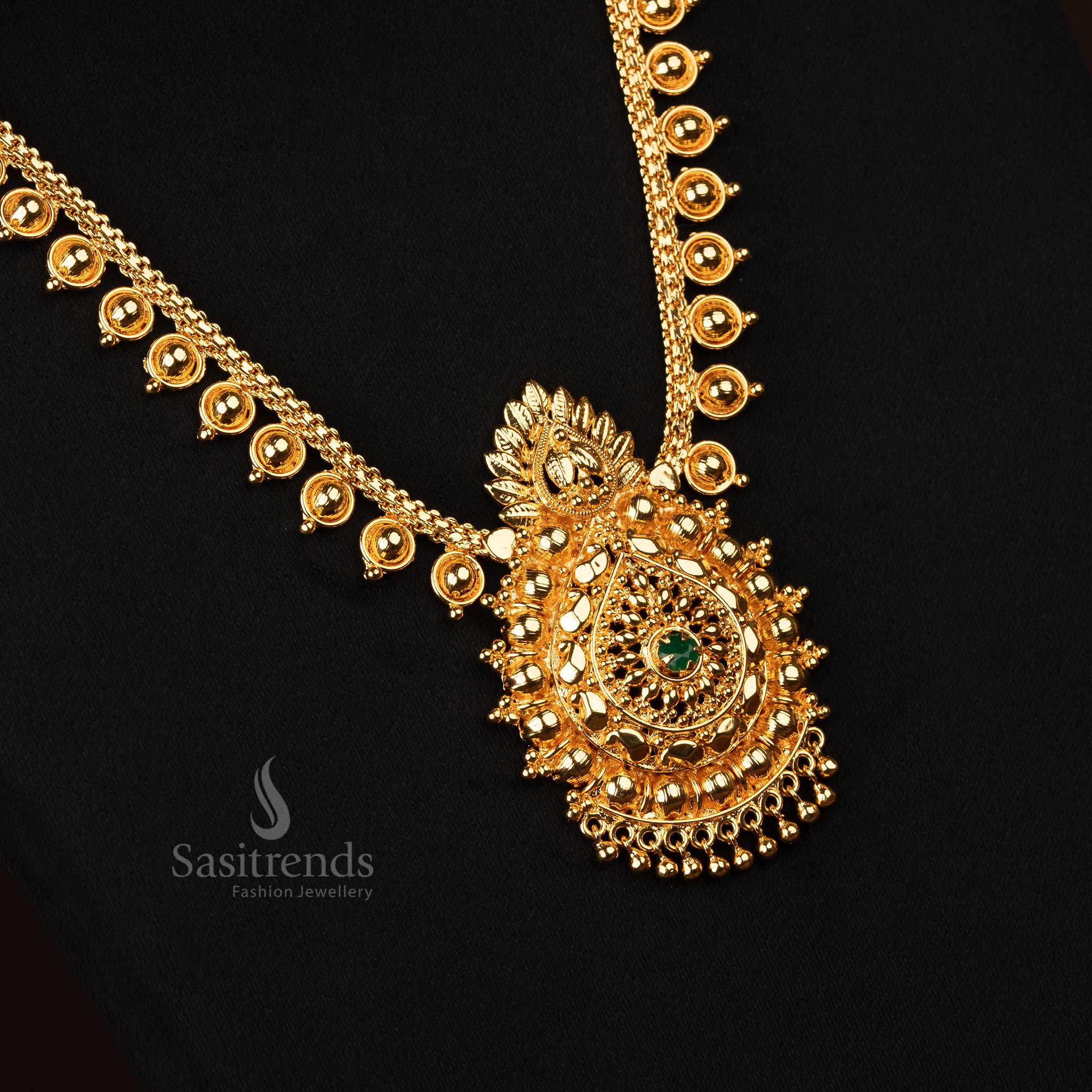 Exquisite micro gold-plated floral designer long necklace with sparkling green AD stones, ideal for traditional and formal events - Sasitrends