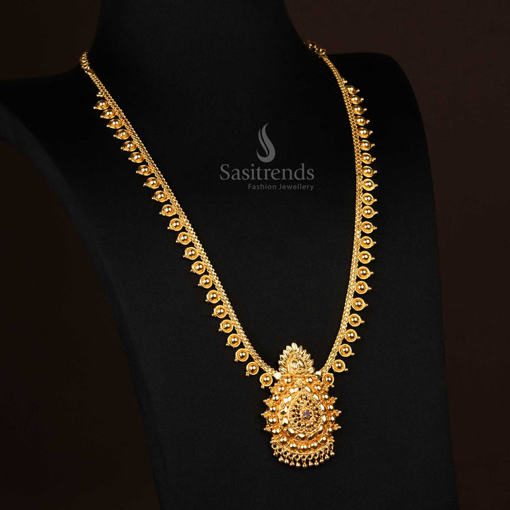 A traditional micro gold-plated long necklace featuring a floral design adorned with ruby AD stones, ideal for weddings and festive occasions - Sasitrends