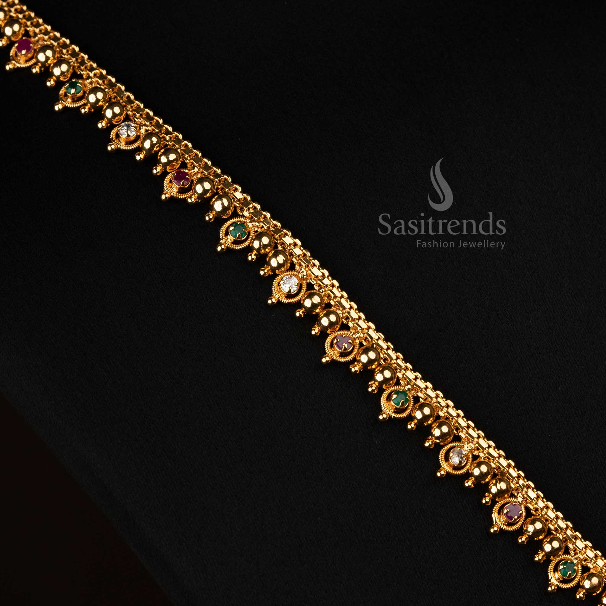 Regal South Indian long necklace with micro gold plating, showcasing a stunning multi-stone pendant for an opulent appearance