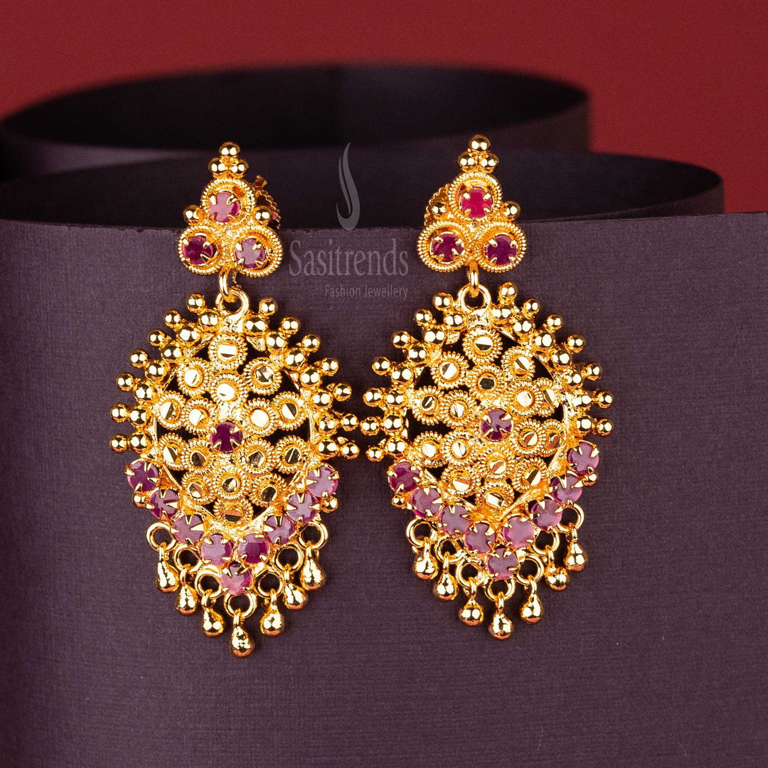 Traditional ruby teardrop earrings in gold plated finish