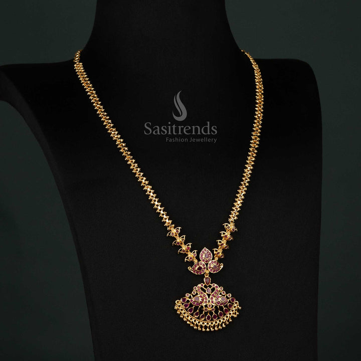 Elegant ruby-studded micro gold-plated necklace featuring a peacock pendant, AD stones, and hanging beads for traditional wear - Sasitrends