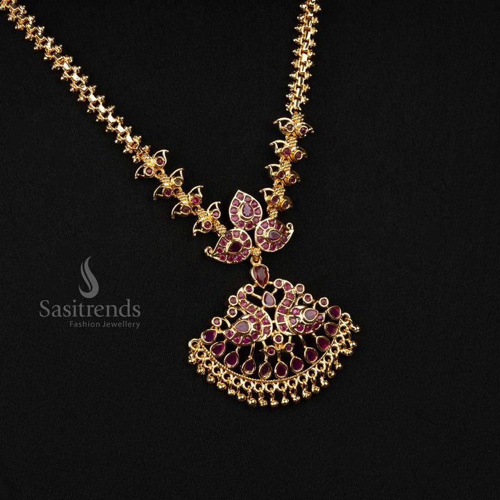 Luxurious long micro gold-plated necklace with a ruby-themed peacock pendant and hanging beads, perfect for temple events - Sasitrends