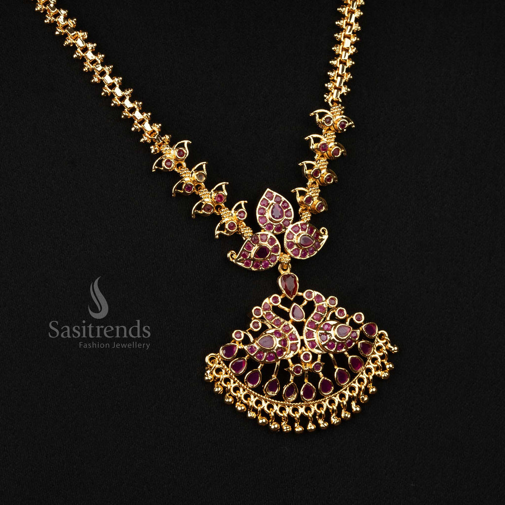 Traditional long necklace with ruby-studded micro gold plating, peacock pendant, and dangling beads, ideal for weddings and temple functions - Sasitrends