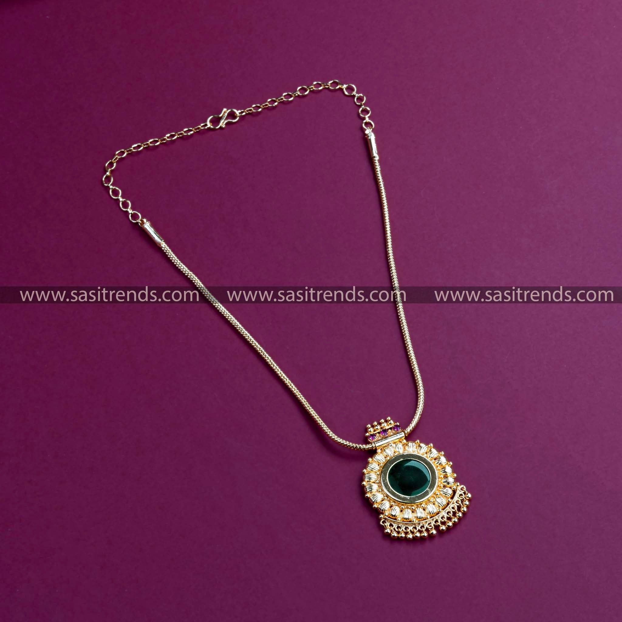 Palakka round pendant on a micro gold-plated chain, exemplifying traditional opulence.