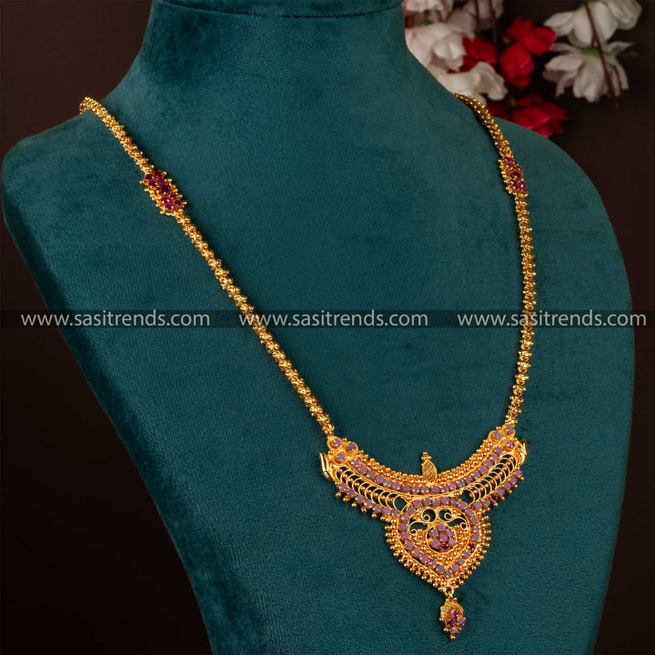 Intricate ruby pendant on a micro gold-plated chain, reflecting South Indian temple jewellery elegance