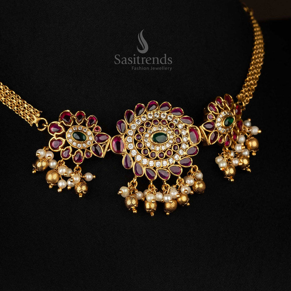 Intricate bridal temple jewellery choker set in matte gold with Kemp stones and delicate pearl embellishments - Sasitrends