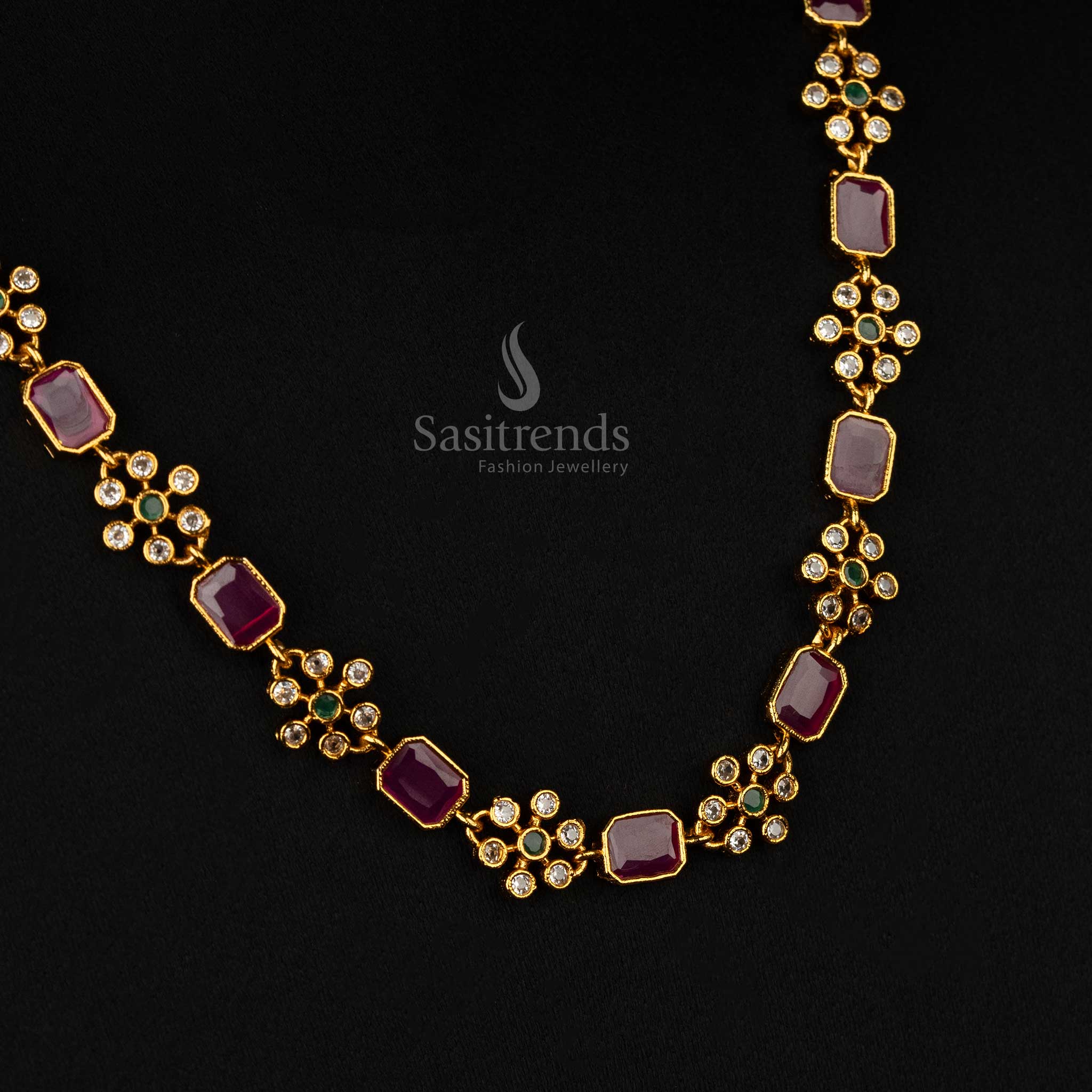 Luxurious traditional jewellery set in matte gold with ruby accents and shimmering American diamonds, perfect for special occasions - Sasitrends