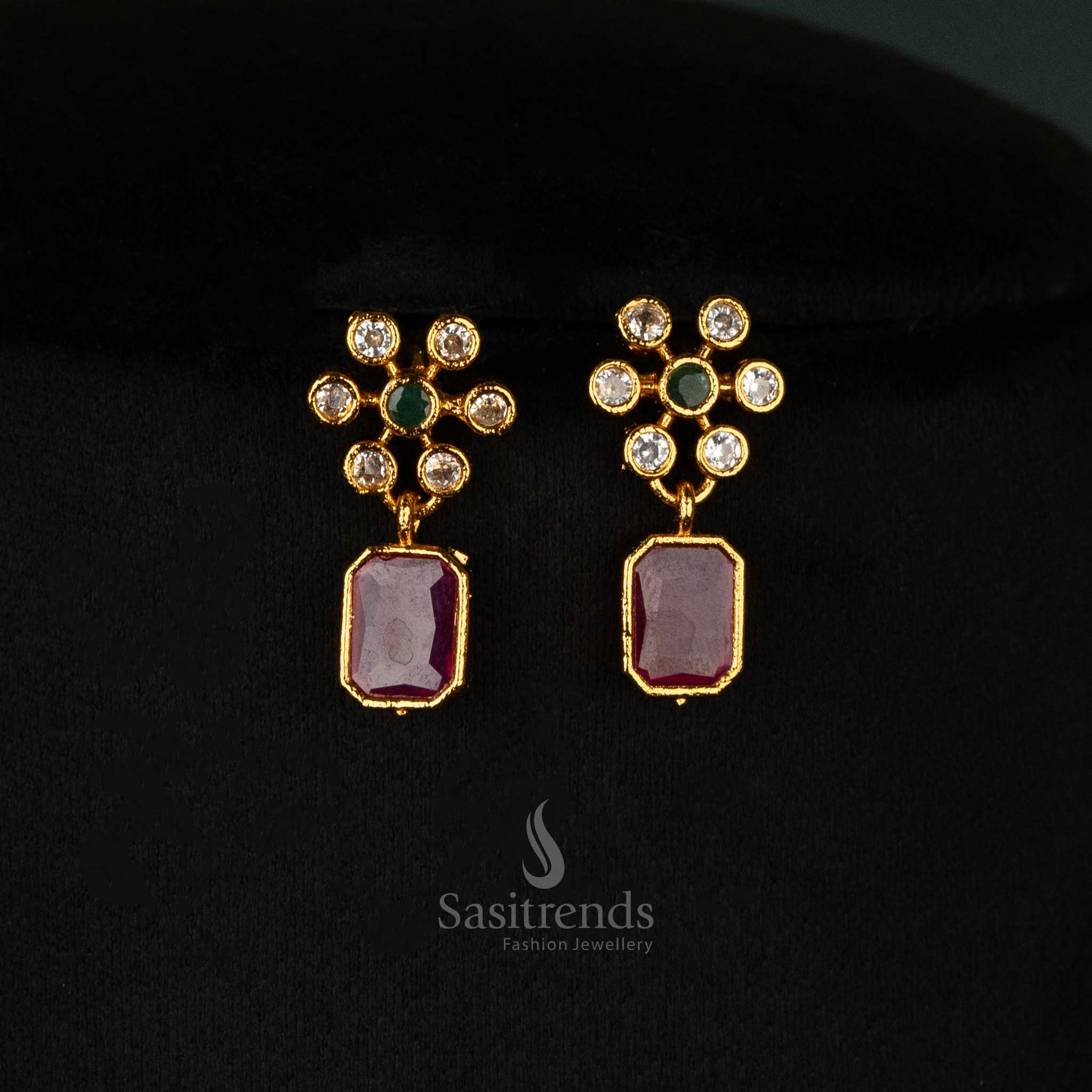 Elegant matte gold necklace set with vibrant ruby stones and dazzling American diamonds, crafted for weddings and celebrations - Sasitrends