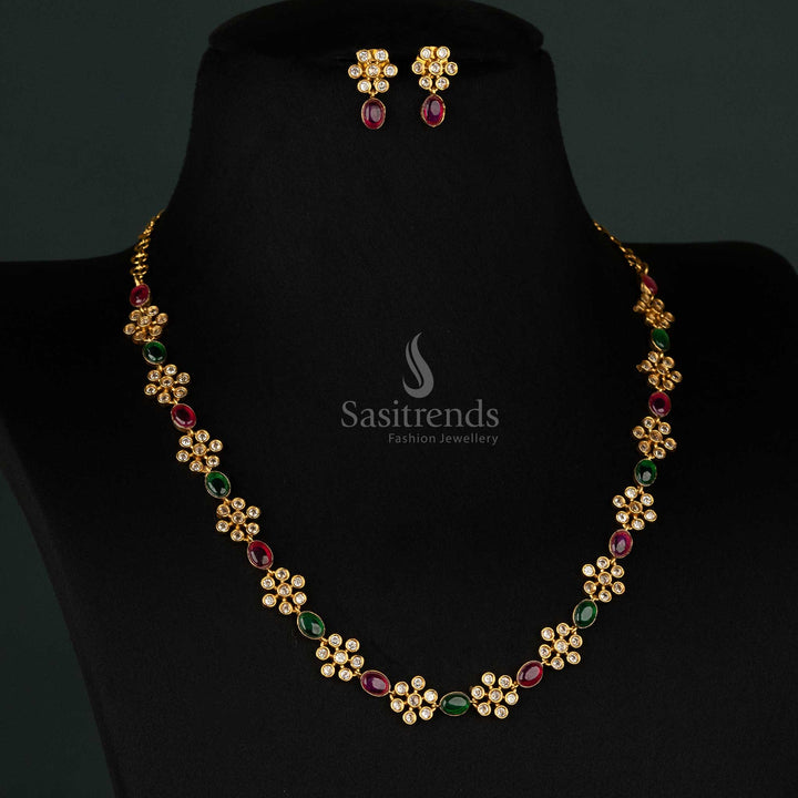 Stunning floral-design jewellery set in matte gold featuring ruby-green accents and dazzling American diamond stones - Sasitrends