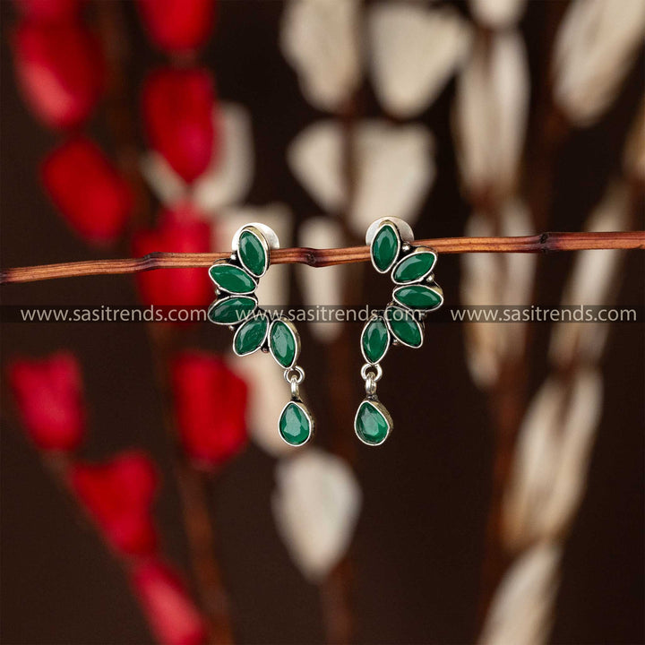 Trendy oxidised earrings with green marquise stones in leaf design and waterdrop accent sasitrends navarathiri special