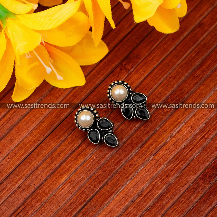 Latest oxidised central pearl and cascading black waterdrop accents navarathiri special earrings