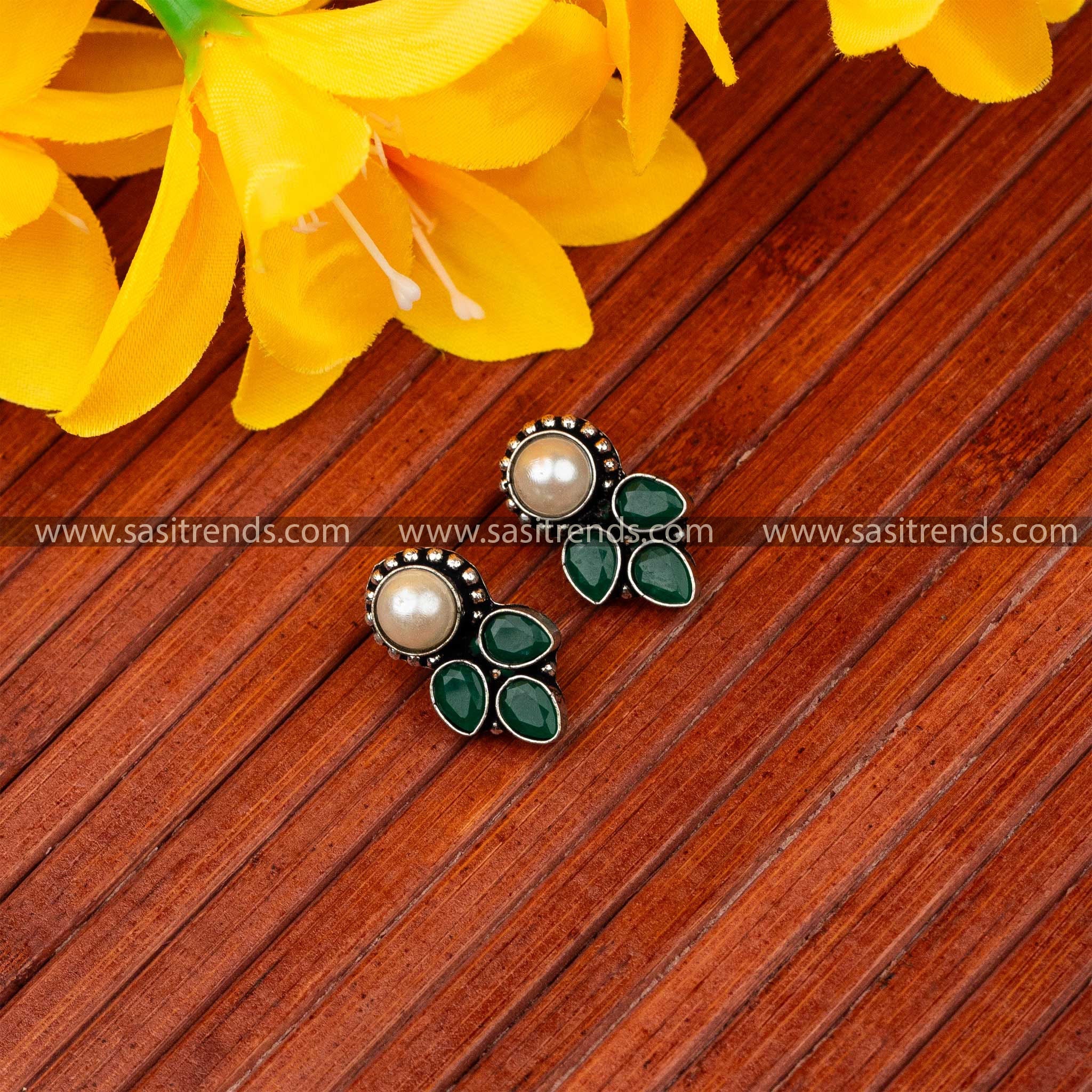 Oxidised earrings with central pearl and cascading drop waterdrop accents navarathiri best collections