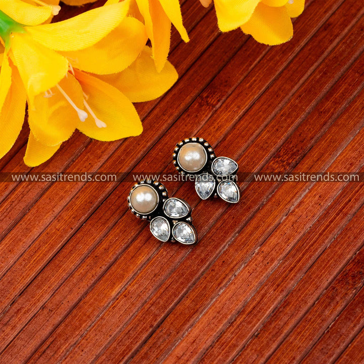 Trendy oxidised central pearl and cascading white waterdrop accents navarathiri special