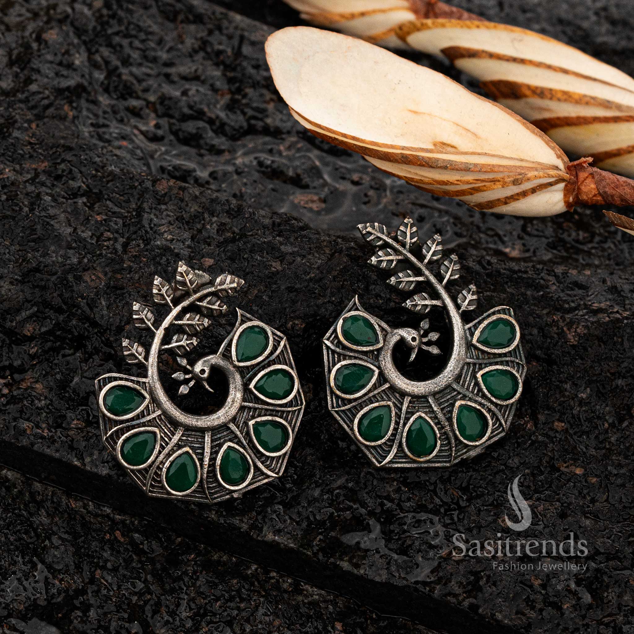 Traditional oxidised earrings with peacock motif and Green stones - Sasitrends 