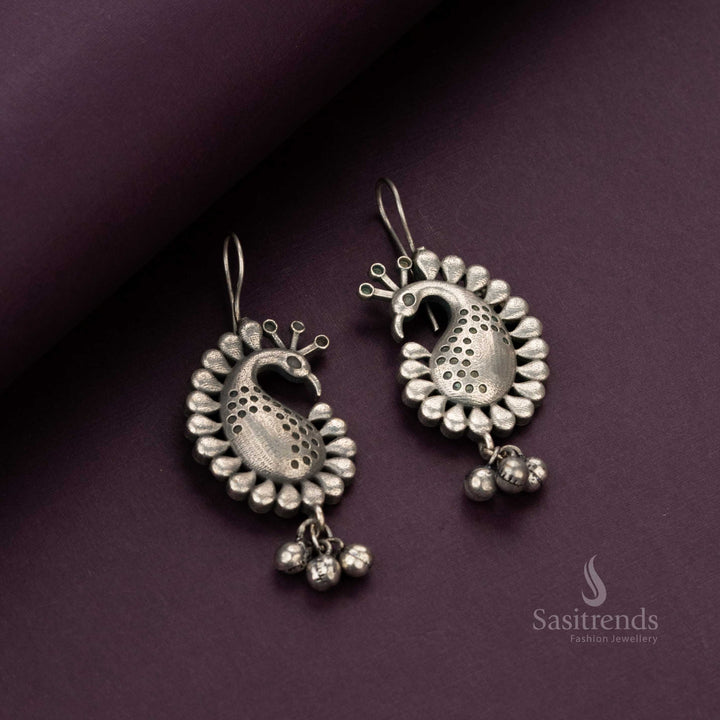 Antique oxidised peacock earrings with intricate detailing - Sasitrends