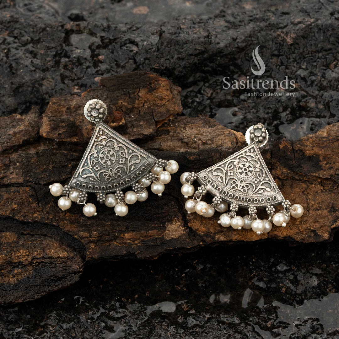 Antique oxidised fan earrings with intricate floral details - Sasitrends