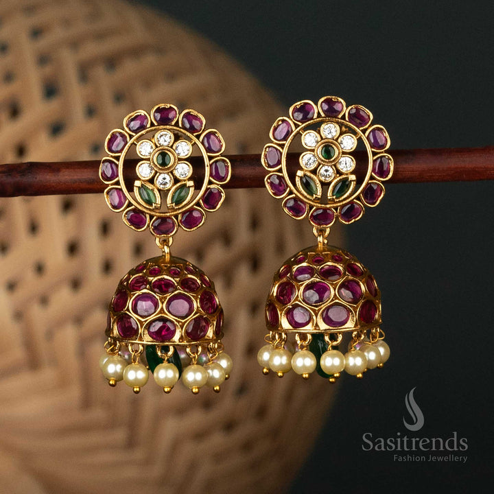 Elegant matte gold-plated earrings with floral motifs, leaf detailing, and pearl embellishments - Sasitrends