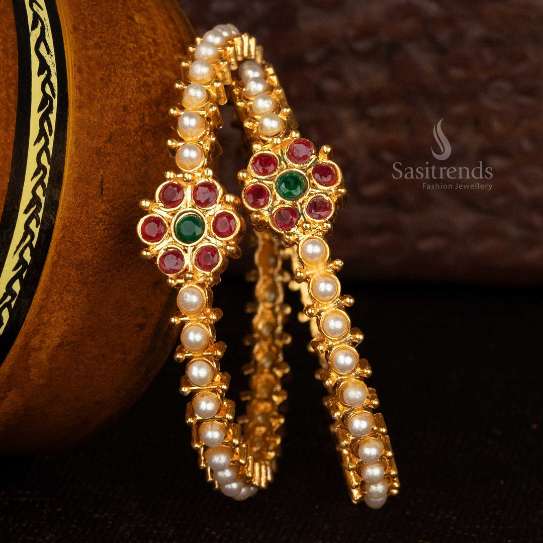 Floral motif gold bangles with matte finish and ruby accents - Sasitrends