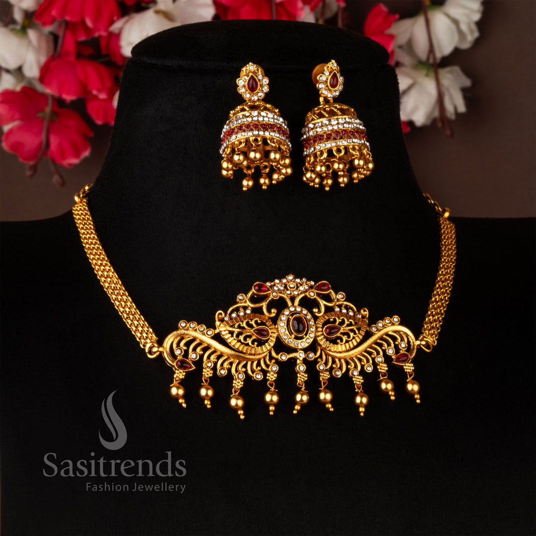 Heritage-inspired matte gold temple choker necklace set with intricate leaf and floral motifs, decorated with luminous white and ruby American diamonds - Sasitrends