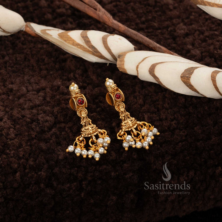 Traditional temple  Earrings with Ruby stones and Lakshmi motifs - Sasitrends