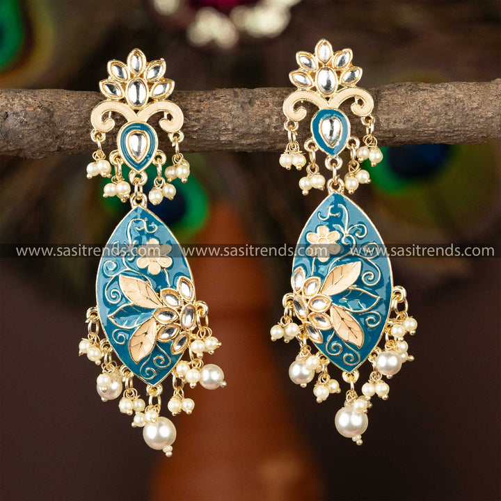 Chic gold-plated kundan earrings with blue enamel inlay and pearl drops.