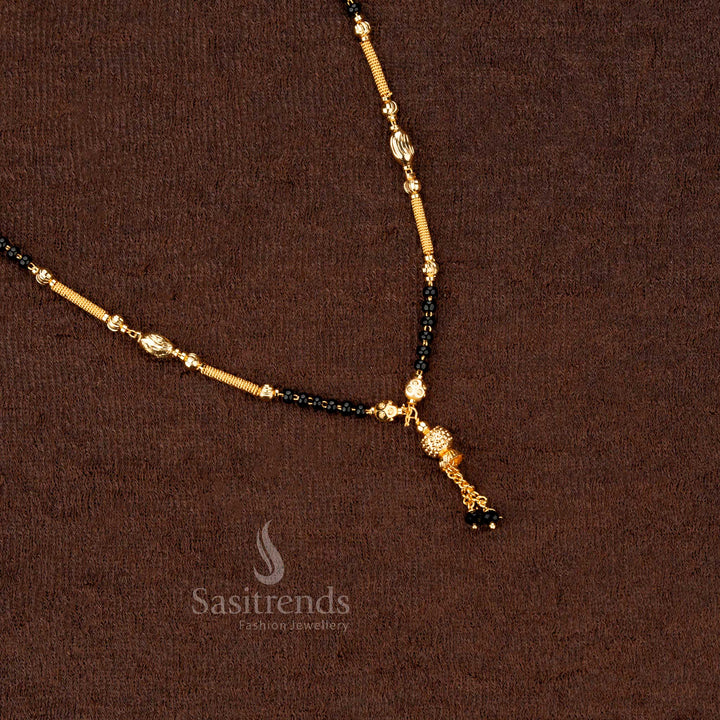 Mesmerising trendy gold-plated beaded mangalsutra with black beads and delicate detailing, offering an elegant touch to festive wear - Sasitrends