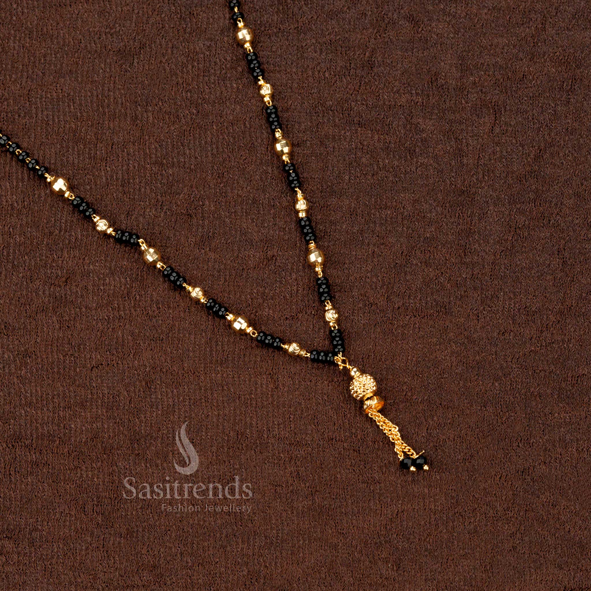 Timeless gold-plated mangalsutra with fine black beads and handcrafted beaded artistry, exuding sophistication and cultural heritage - Sasitrends