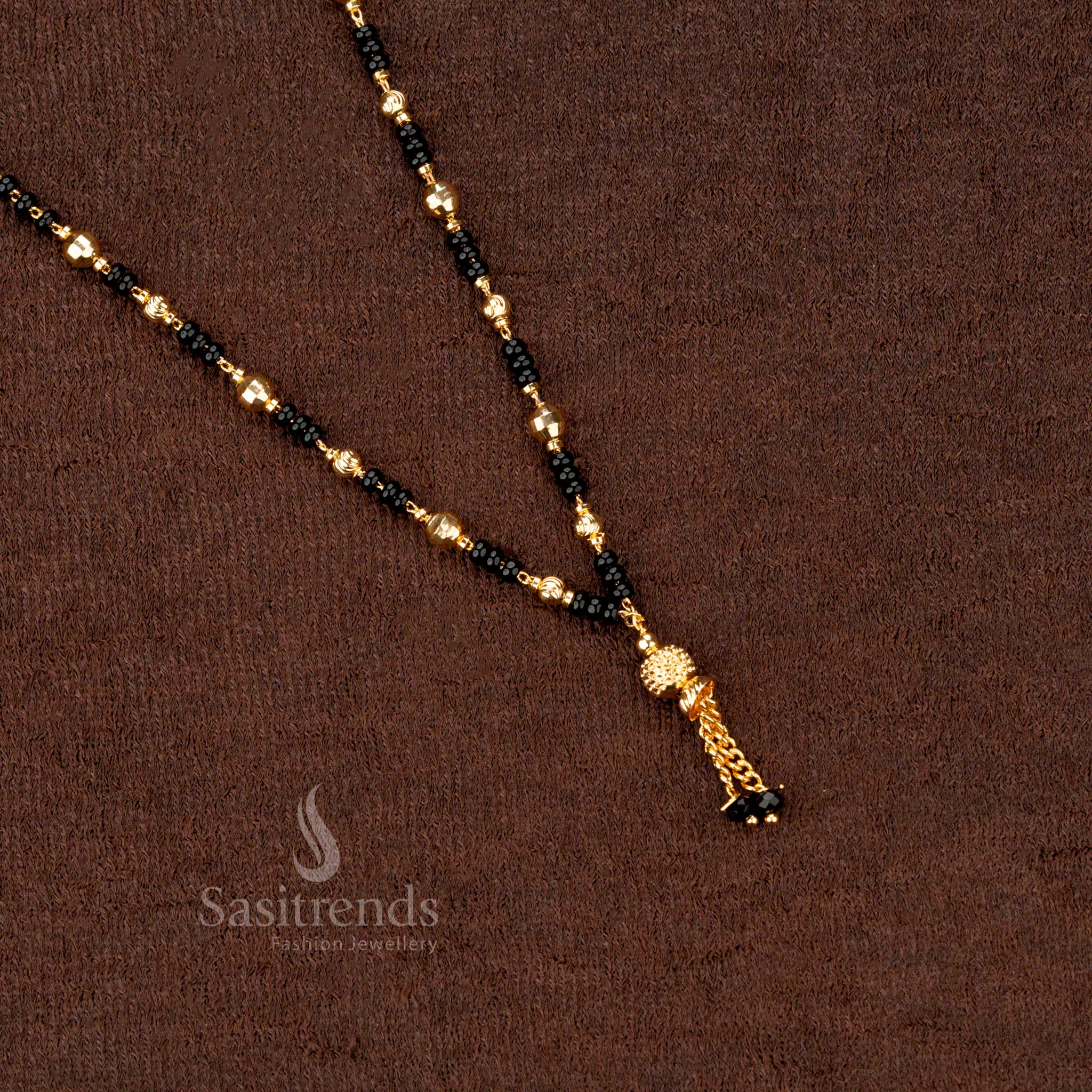  Ethereal handmade gold-plated mangalsutra with black beads and exclusive beaded work, crafted for timeless beauty and elegance - Sasitrends