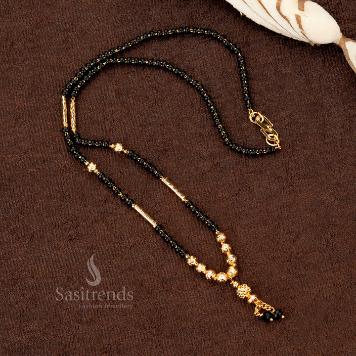 Antique-finish micro gold-plated beaded mangalsutra with black beads, a perfect jewellery piece for a timeless traditional look - Sasitrends