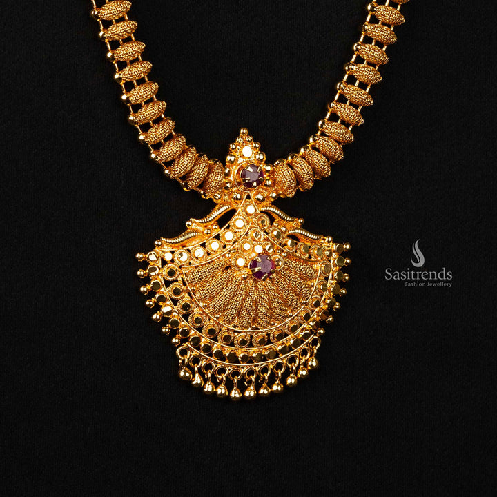 Wedding One Gram Gold Plated Ruby AD Stone Combo Necklace Set with intricate tilak motifs and hanging golden balls - Sasitrends