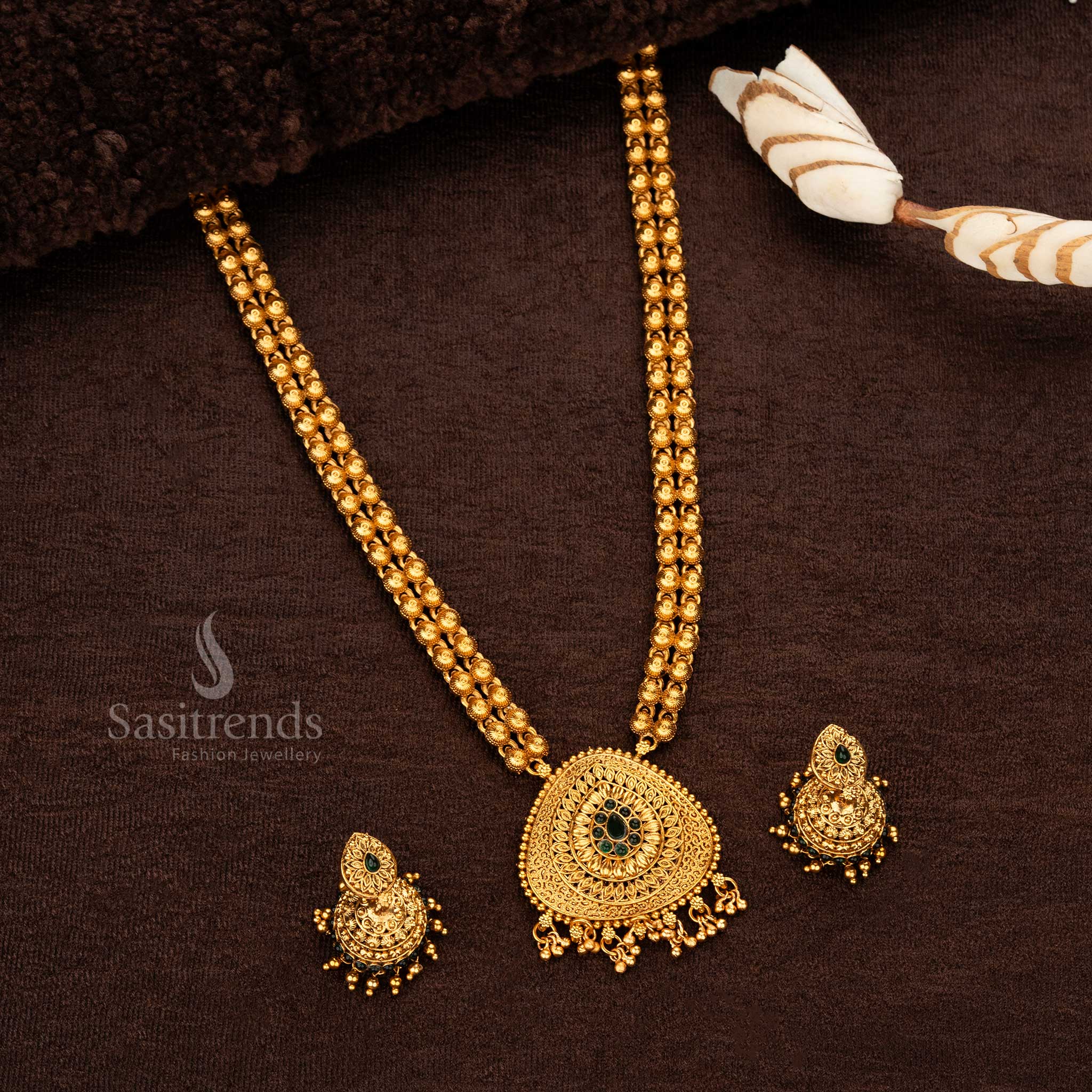 Matching jhumka earrings with golden ball danglings and intricate design - Sasitrends