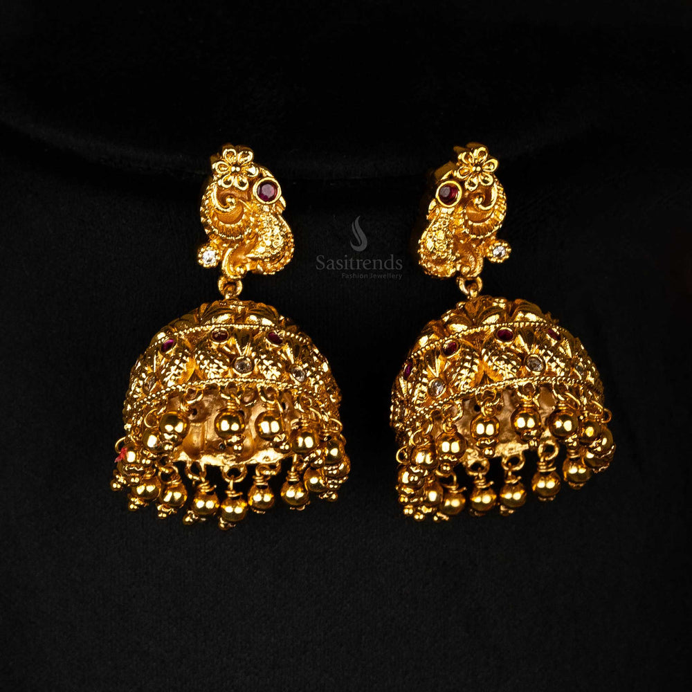 Long temple necklace with Lakshmi motif and elephants, jhumka earrings  