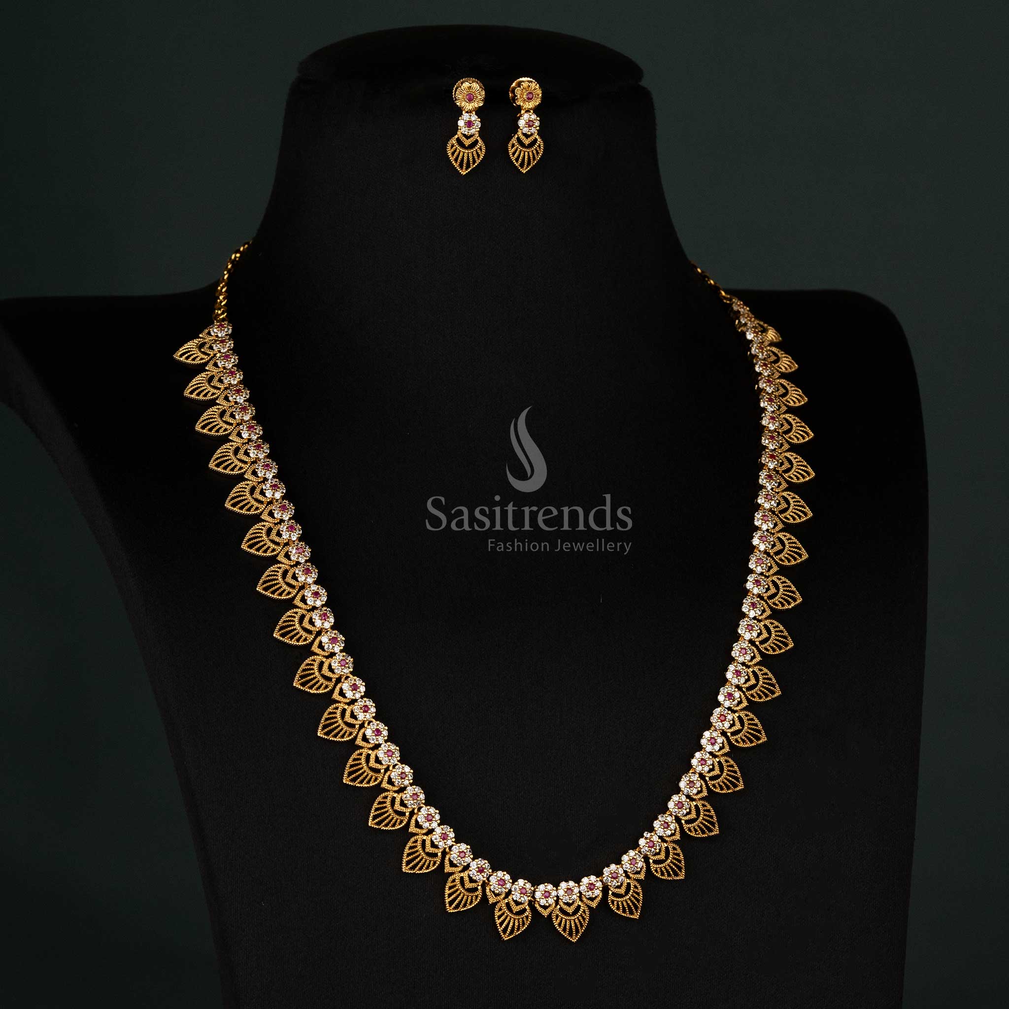 Elegant handcrafted matte gold plated Long necklace set with floral AD stone embellishments – Sasitrends