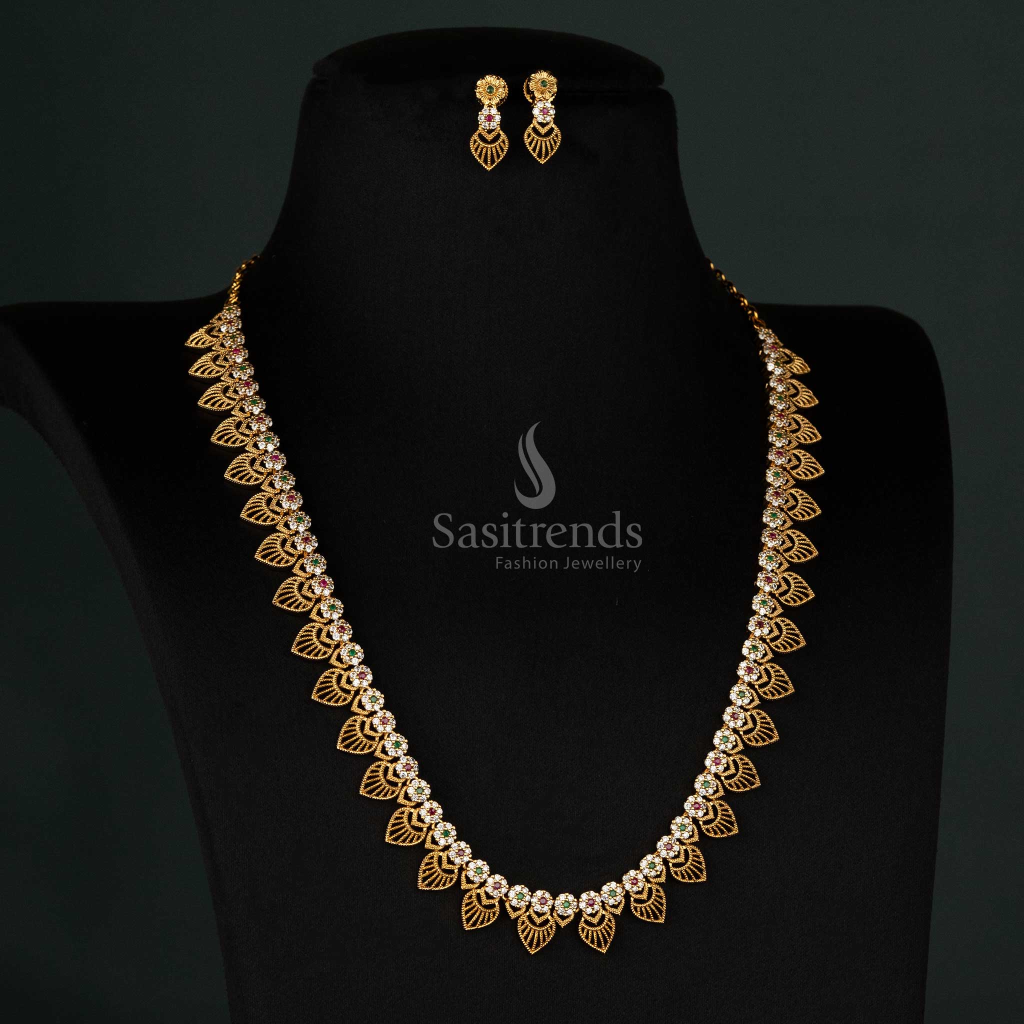 Traditional saree wear matte gold Long necklace set with detailed floral and leaf embellishments – Sasitrends