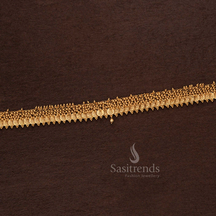 Matte gold plated temple hip belt with small Lakshmi coins, golden bead detailing, and structured design – Sasitrends