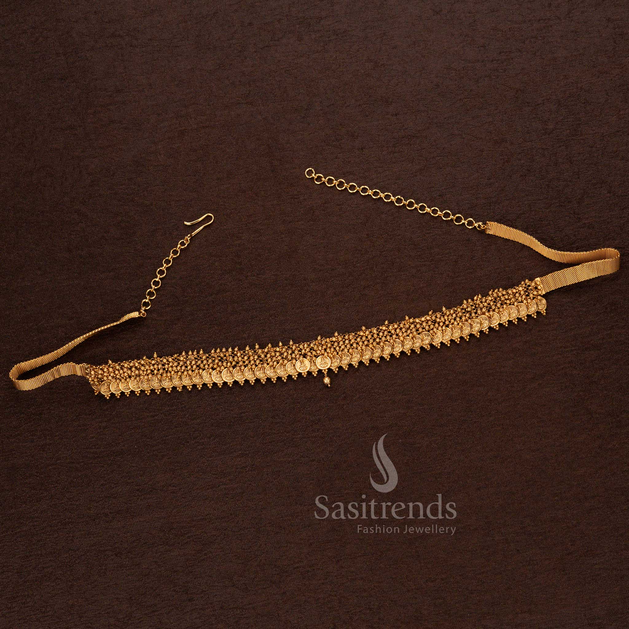 Matte gold plated temple hip belt with small Lakshmi coins, golden bead detailing, and structured design – Sasitrends