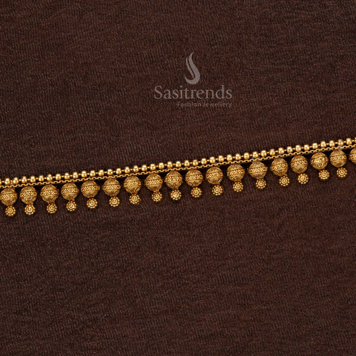 Luxury temple jewellery waist belt with an array of finely crafted golden beads, intricate carvings, and traditional bead dangles – Sasitrends