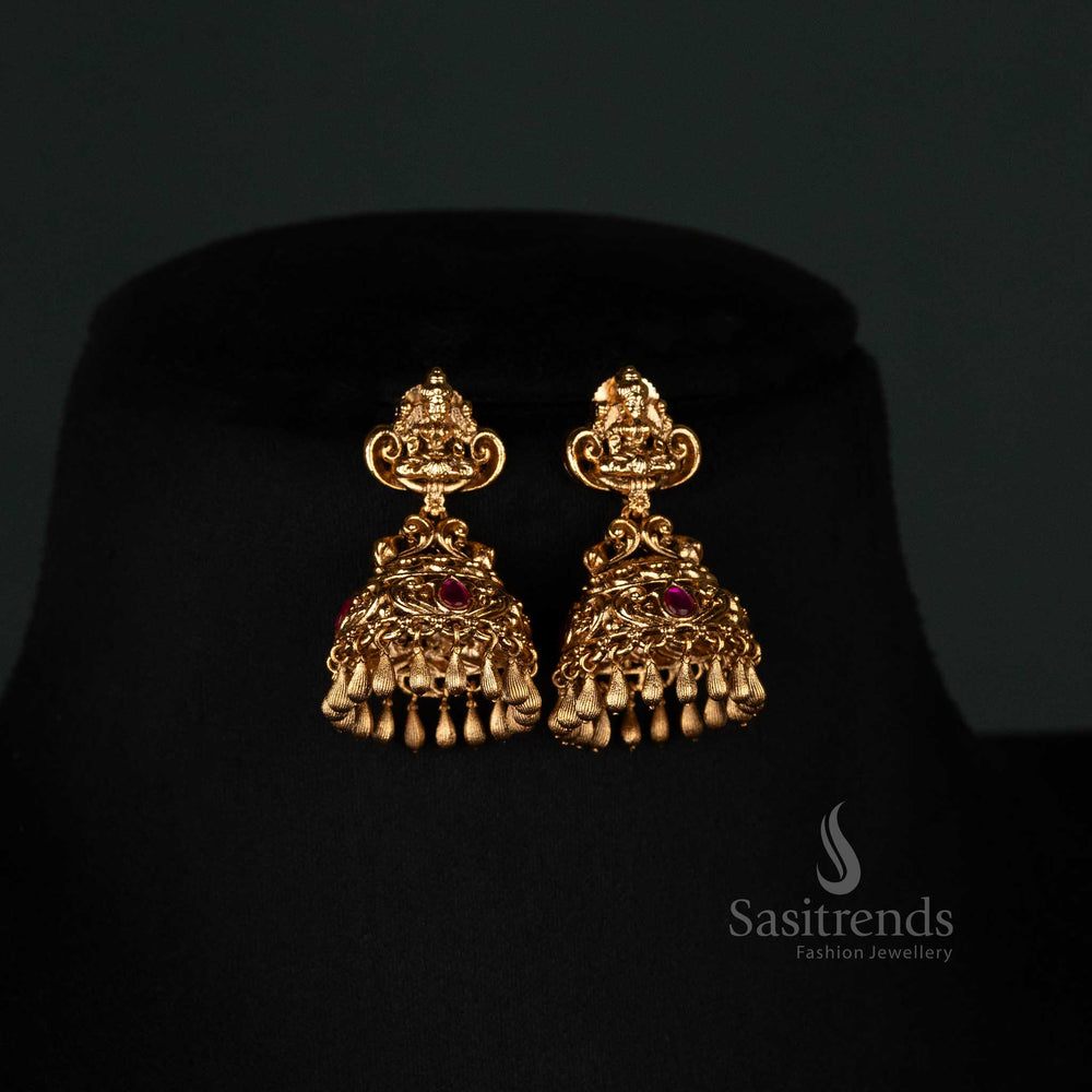 Traditional bridal jewellery set featuring a grand Lakshmi pendant and jhumka earrings Sasitrends