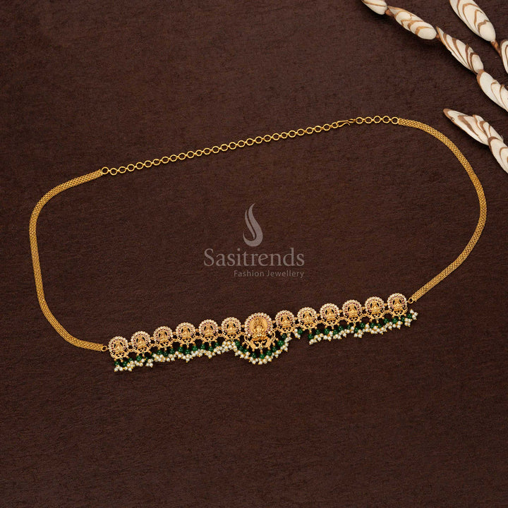 Elegant designer matte gold temple hip belt showcasing intricate Lakshmi craftsmanship with luminous green agate pearls, an ideal pick for traditional festive jewellery - Sasitrends