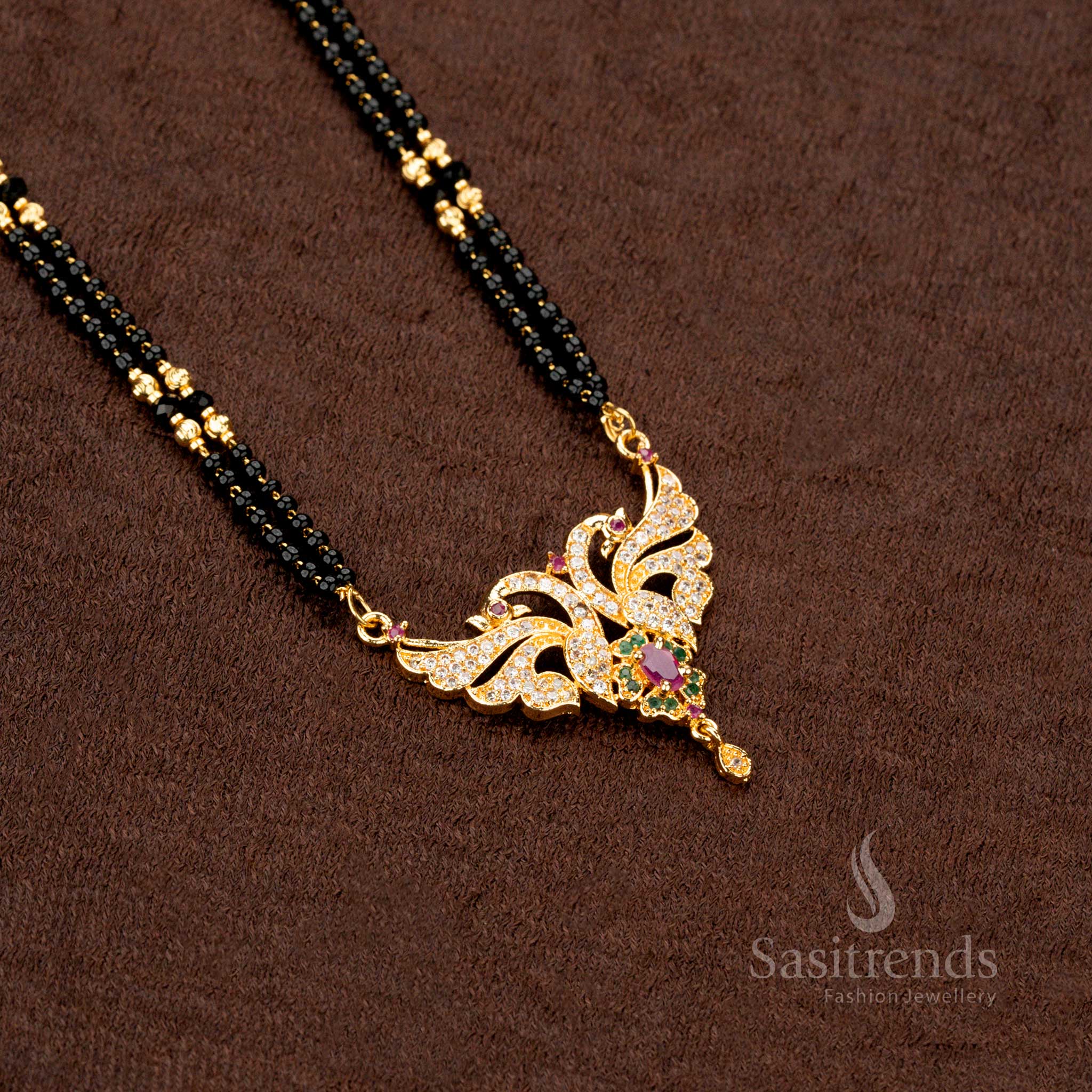 Royal bridal gold-plated 24-inch mangalsutra with black beads and an artistic AD pendant, perfect for weddings - Sasitrends