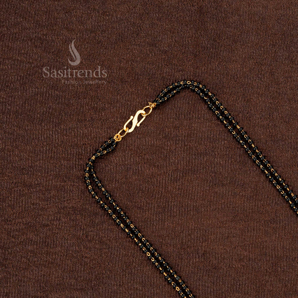 Gold plated mangalsutra with black beads chain and unique floral pendant - Sasitrends