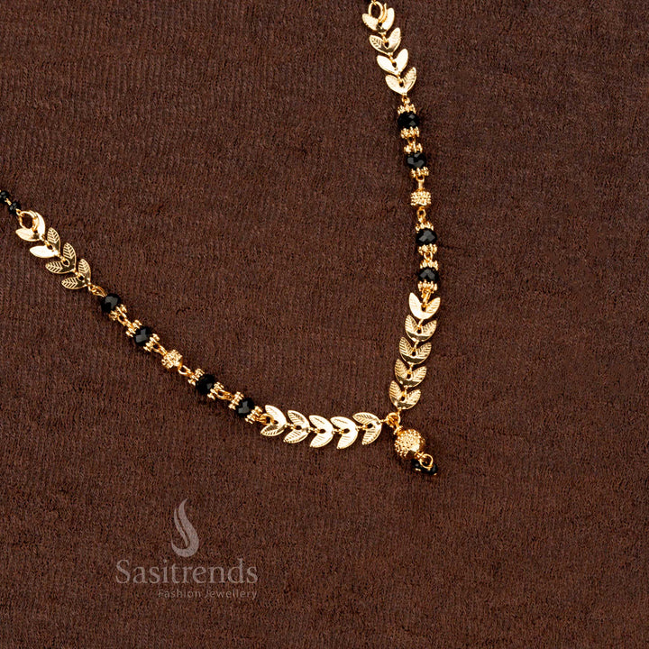 Beautiful traditional gold-plated mangalsutra featuring black beads and temple-style beadwork, a perfect ethnic jewellery piece - Sasitrends