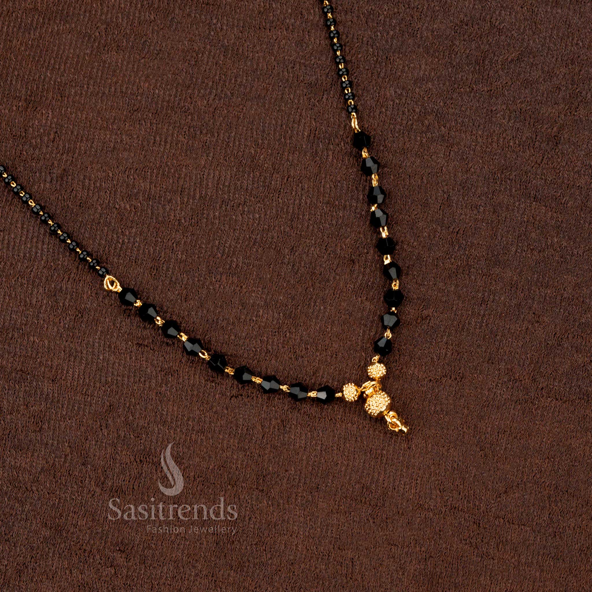 Luxurious micro gold-plated black beads mangalsutra with festive beadwork design, adding a touch of glamour to traditional jewellery - Sasitrends