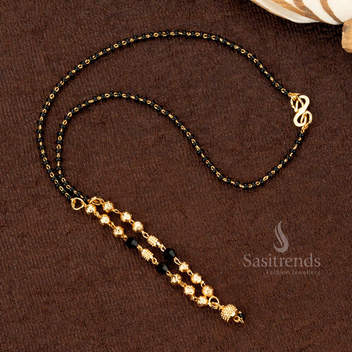 Royal traditional gold-plated black beads chain mangalsutra with exclusive designer beadwork, ideal for weddings and special occasions - Sasitrends