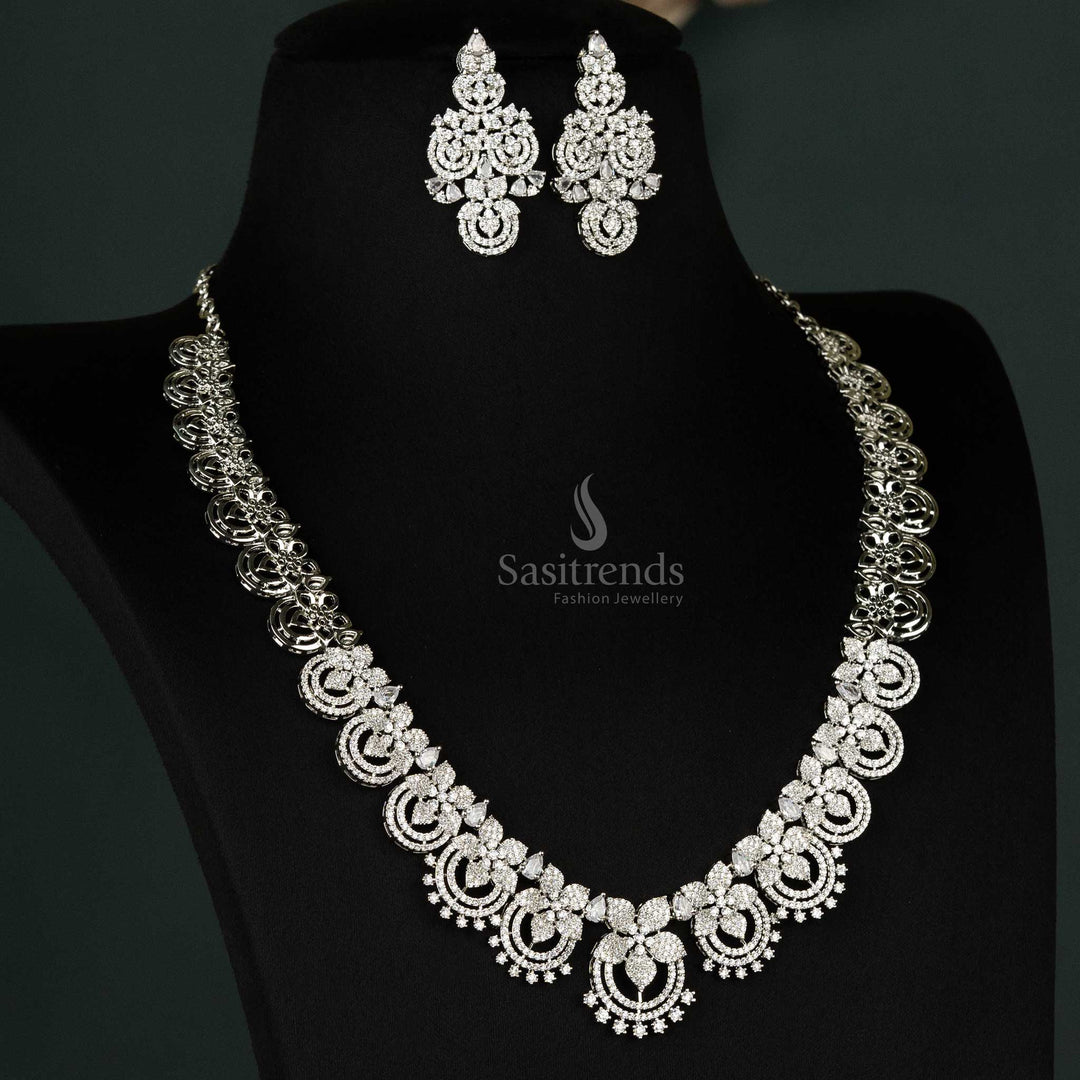 Sophisticated jewellery set in rhodium silver plating, featuring exquisite circular designs and shimmering American diamonds, ideal for weddings and parties - Sasitrends