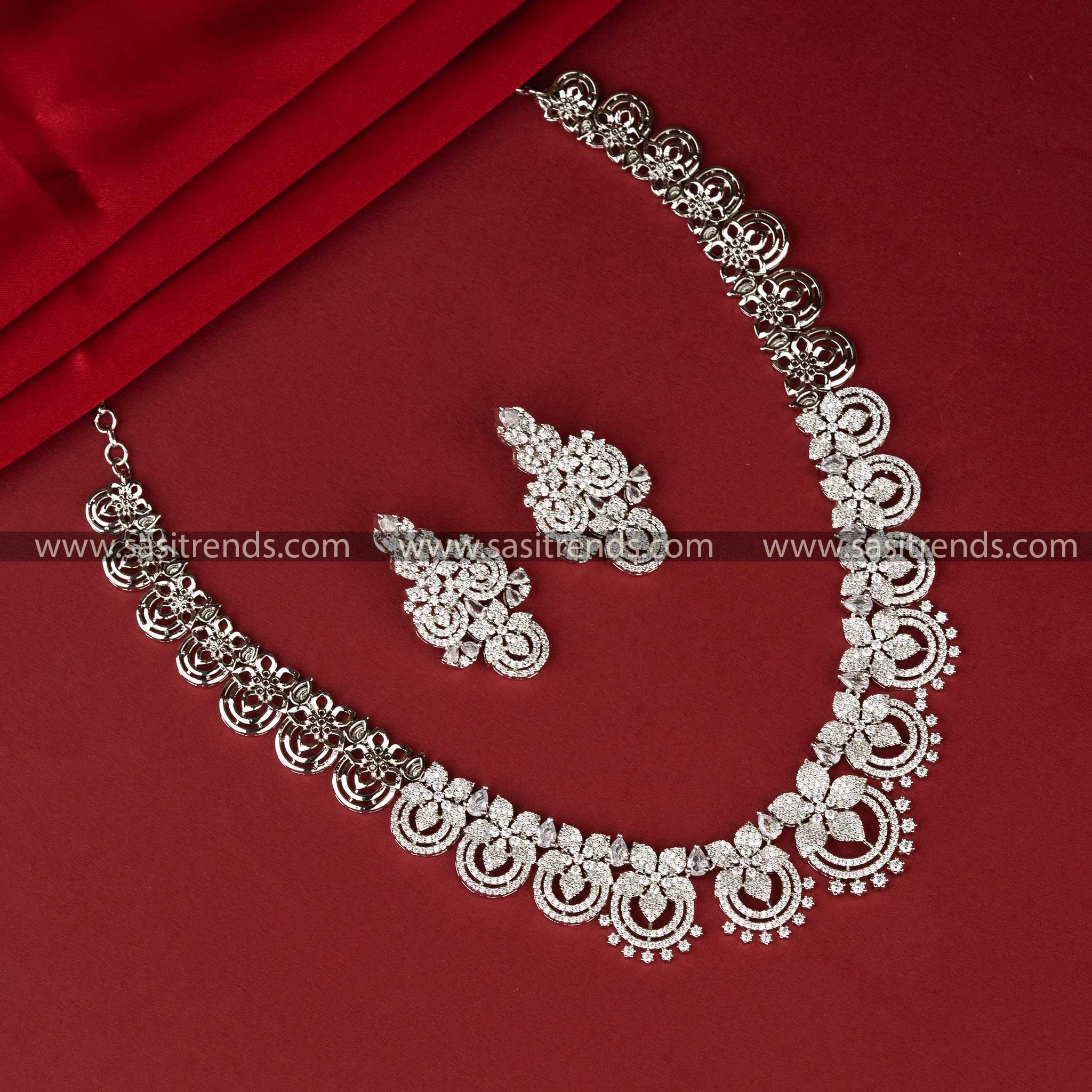 Elegant Rhodium Silver Plated American Diamond Jewellery Set with Circular Motifs