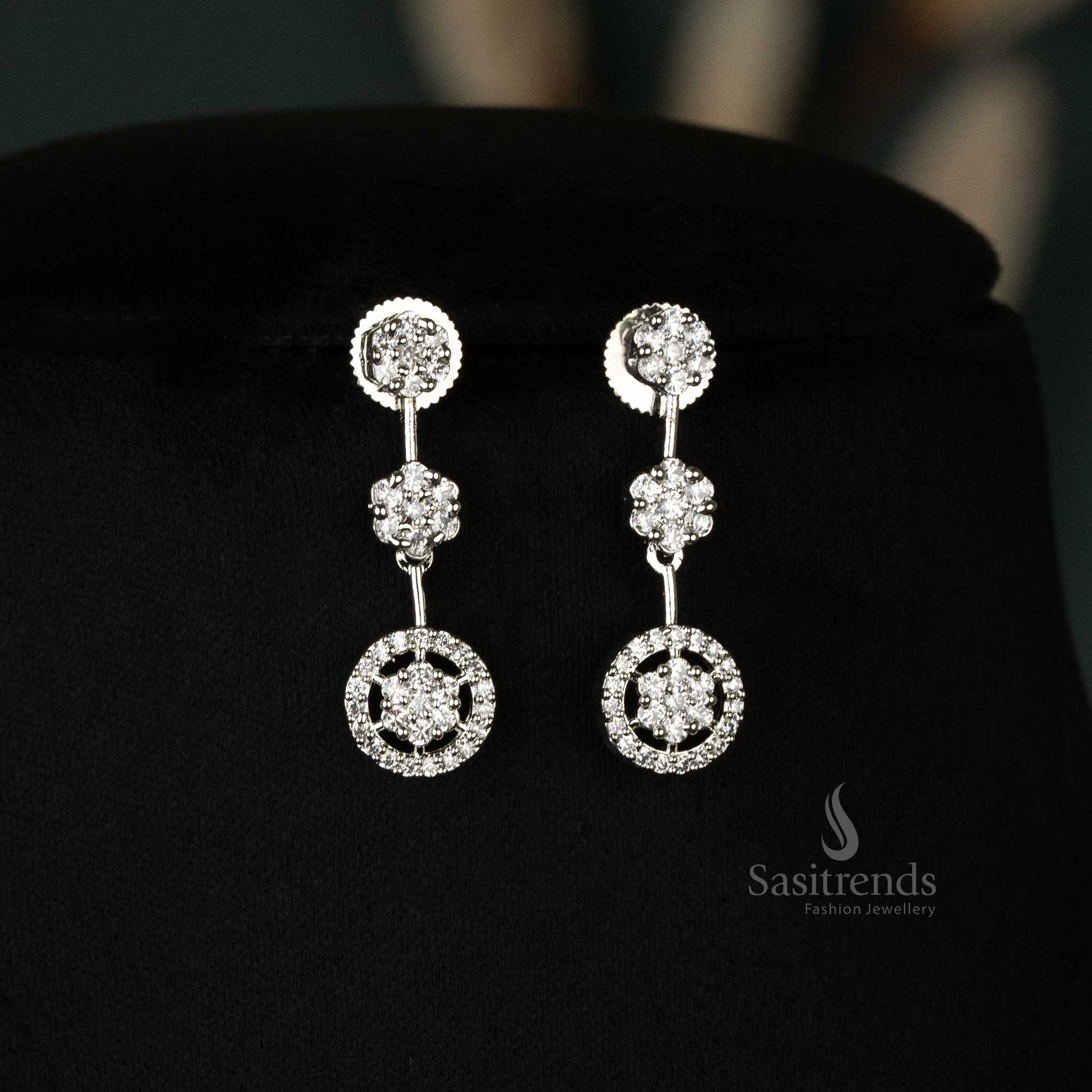 Sparkling rhodium-plated two-layered circular motif American diamond stylish earrings for a contemporary look - Sasitrends